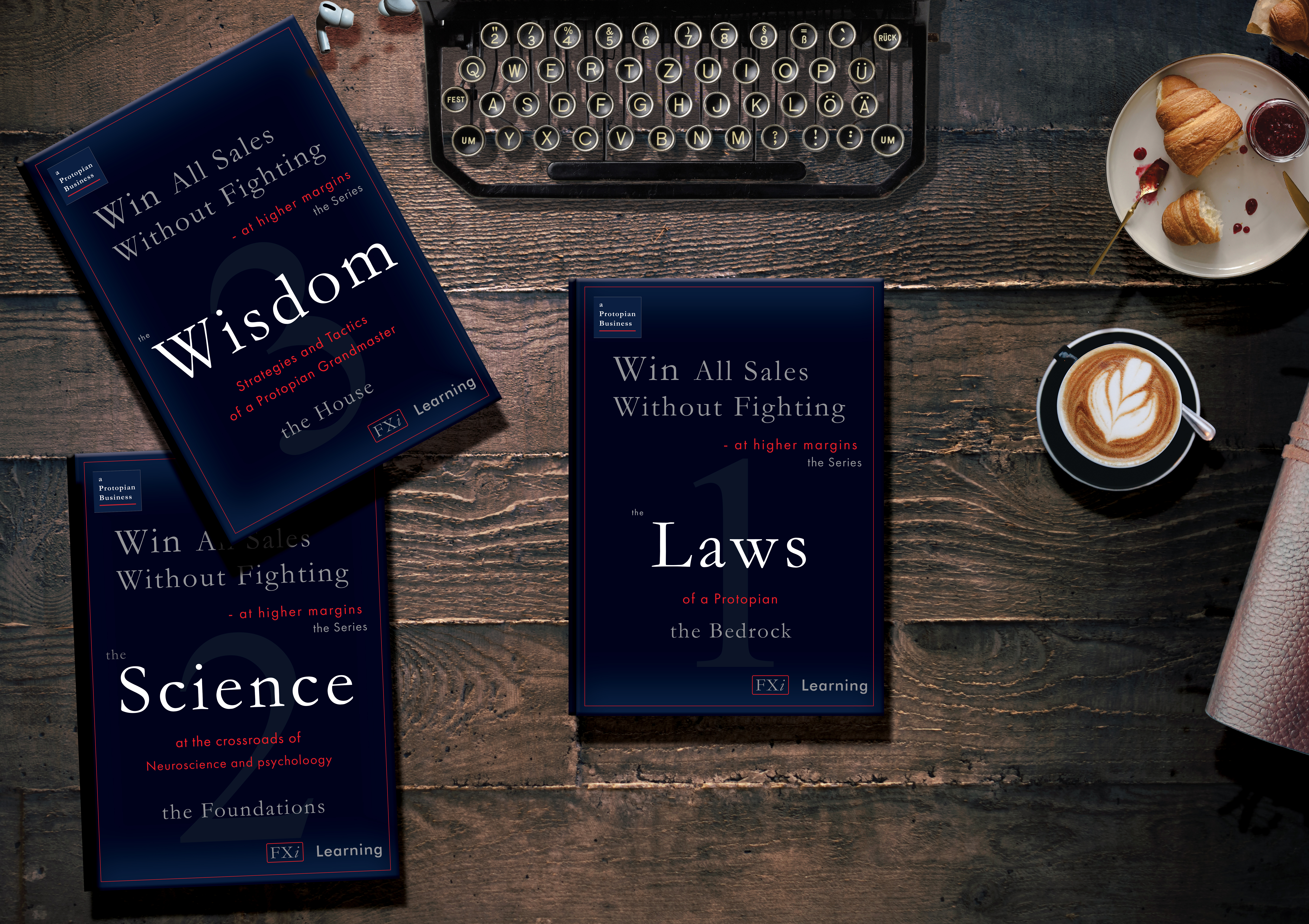 The last picture in the “free ebook” section is of the three books in the series “Win All Sales without fighting at higher margins. The background is an antique hardwood desk. There is an antique black cast metal typewriter top center, only showing the front part with all the keys. The first book, the Laws, is in the center of the screen; the second book, the Science, is bottom left, slightly turned to the left; the third book is placed at about 15 degrees to the left, and the bottom part is on top of the second book that is in the bottom left. There are a set of apple earbud headphones between the third book and the typewriter; a cappuccino with a flower design in the foam is on the right side—a small teaspoon on the saucer, with dark blue trim. A partially eaten croissant on ta dish is above the cappuccino and slightly to the right. There is a small single-serving glass jar of jam and a  tiny spoon with strawberry jam on the plate. To the right is the edge of a leather-bound journal. The light source appears to be coming from an off-screen light on the left side of the typewriter at the top.